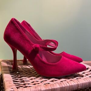Halston. Framboise suede pumps.